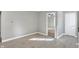 Light-filled hallway with gray walls and doors at 7234 N Christopher Ln, Fairland, IN 46126