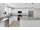 Modern kitchen with white cabinets, granite countertops and island at 7234 N Christopher Ln, Fairland, IN 46126