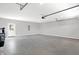 Spacious garage with an automatic door opener and epoxy flooring at 7234 N Christopher Ln, Fairland, IN 46126