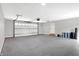 Two-car garage with an automatic door opener and epoxy flooring at 7234 N Christopher Ln, Fairland, IN 46126