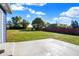 View of backyard, showing large grassy area and wooden privacy fence at 7234 N Christopher Ln, Fairland, IN 46126
