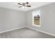 Spacious bedroom with ceiling fan and neutral carpeting at 7234 N Christopher Ln, Fairland, IN 46126