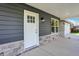 White front door and stone base at 7234 N Christopher Ln, Fairland, IN 46126