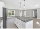 Modern kitchen with an island and stainless steel appliances at 7234 N Christopher Ln, Fairland, IN 46126