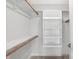 Walk-in closet with shelving and hanging rods at 7234 N Christopher Ln, Fairland, IN 46126