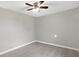 Simple bedroom with ceiling fan and neutral walls at 7234 N Christopher Ln, Fairland, IN 46126