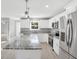 Modern kitchen with a large island and stainless steel appliances at 7234 N Christopher Ln, Fairland, IN 46126