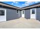 Spacious back patio with access from multiple exterior doors at 7234 N Christopher Ln, Fairland, IN 46126