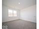 Spacious bedroom with gray carpet and ample natural light at 5628 Cattail Branch Ln, Clayton, IN 46118