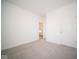 Spacious bedroom with neutral carpet and an open doorway at 7920 Magnolia St, New Palestine, IN 46163