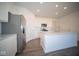 Modern kitchen with stainless steel appliances and island at 7920 Magnolia St, New Palestine, IN 46163