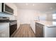 Modern kitchen featuring stainless steel appliances and a spacious island at 7920 Magnolia St, New Palestine, IN 46163