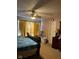 Primary bedroom with ceiling fan and large window at 1449 Danielle Dr, Indianapolis, IN 46231