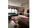 Spacious living room with a fireplace and large TV at 1449 Danielle Dr, Indianapolis, IN 46231