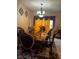 Formal dining room with a large table and chandelier at 1449 Danielle Dr, Indianapolis, IN 46231