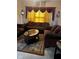 Living room with brown sofas and a marble-top coffee table at 1449 Danielle Dr, Indianapolis, IN 46231