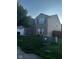 Two-story home with a front yard and driveway at 1449 Danielle Dr, Indianapolis, IN 46231