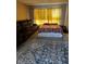 Bedroom with a queen-size bed and sectional sofa at 1449 Danielle Dr, Indianapolis, IN 46231