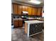Kitchen boasts ample cabinetry and a tile backsplash at 1449 Danielle Dr, Indianapolis, IN 46231