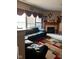 Cozy living room featuring a fireplace and large windows at 1449 Danielle Dr, Indianapolis, IN 46231