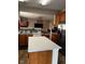 Open kitchen with an island overlooking the living room at 1449 Danielle Dr, Indianapolis, IN 46231
