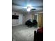 Spacious bedroom with a workspace and large TV at 1449 Danielle Dr, Indianapolis, IN 46231