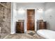 Elegant bathroom with double vanities, a soaking tub, and a shower at 814 E 23Rd St, Indianapolis, IN 46205