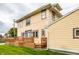 Side view of the house showcasing the deck and siding at 814 E 23Rd St, Indianapolis, IN 46205