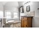 Bathroom with granite vanity and tiled floors at 814 E 23Rd St, Indianapolis, IN 46205