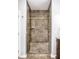 Large walk-in shower with multiple shower heads and a built-in seat at 814 E 23Rd St, Indianapolis, IN 46205
