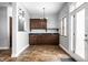 Built-in cabinetry and granite counters in eat-in kitchen area at 814 E 23Rd St, Indianapolis, IN 46205