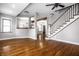 Hardwood floor living room with staircase and open concept at 814 E 23Rd St, Indianapolis, IN 46205