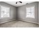 Bright bedroom with neutral walls and carpet flooring at 814 E 23Rd St, Indianapolis, IN 46205