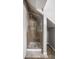 Walk-in shower with tiled walls and glass enclosure at 814 E 23Rd St, Indianapolis, IN 46205