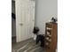 Bedroom with closet and wooden shelving unit at 517 S Warman Ave, Indianapolis, IN 46222