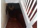 View of wooden staircase leading downstairs at 7716-7718 Michigan Rd, Indianapolis, IN 46268