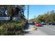 Residential street with cars and trees at 7716-7718 Michigan Rd, Indianapolis, IN 46268