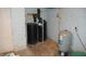 Basement with water softener and pressure tank at 7716-7718 Michigan Rd, Indianapolis, IN 46268