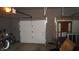 Two-car garage with an automatic garage door at 7716-7718 Michigan Rd, Indianapolis, IN 46268