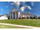 Brick home with three-car garage and basketball hoop at 1957 Cherry Tree Rd, Avon, IN 46123