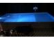 Night view of inground pool, with basketball hoop at 1957 Cherry Tree Rd, Avon, IN 46123