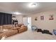 Finished basement with comfortable seating and entertainment center at 1957 Cherry Tree Rd, Avon, IN 46123
