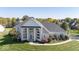 Two story home with large windows and landscaping at 1957 Cherry Tree Rd, Avon, IN 46123