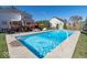 Inviting backyard pool with spacious patio and seating area at 1957 Cherry Tree Rd, Avon, IN 46123