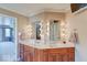 Elegant bathroom with double vanity and lighted mirrors at 1957 Cherry Tree Rd, Avon, IN 46123