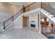 Two-story great room with fireplace and stunning staircase at 1957 Cherry Tree Rd, Avon, IN 46123
