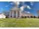 Two-story home with columns and large windows at 1957 Cherry Tree Rd, Avon, IN 46123