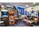 Finished basement game room with arcade games and seating at 1957 Cherry Tree Rd, Avon, IN 46123