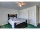 Bedroom with double bed and green carpeting at 1957 Cherry Tree Rd, Avon, IN 46123