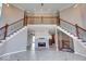 Two-story great room with fireplace and stunning staircase at 1957 Cherry Tree Rd, Avon, IN 46123